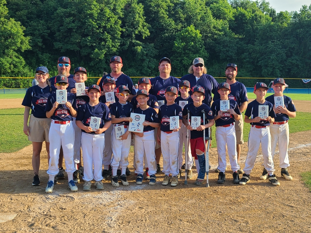 The 2021 Montgomery County 10U Baseball All-Stars proudly hold up their district runner-up plaques.