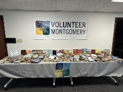 Photo of 400 books on our table.